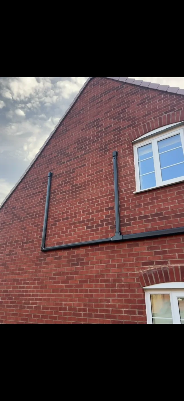 Neat black external air conditioning trunking