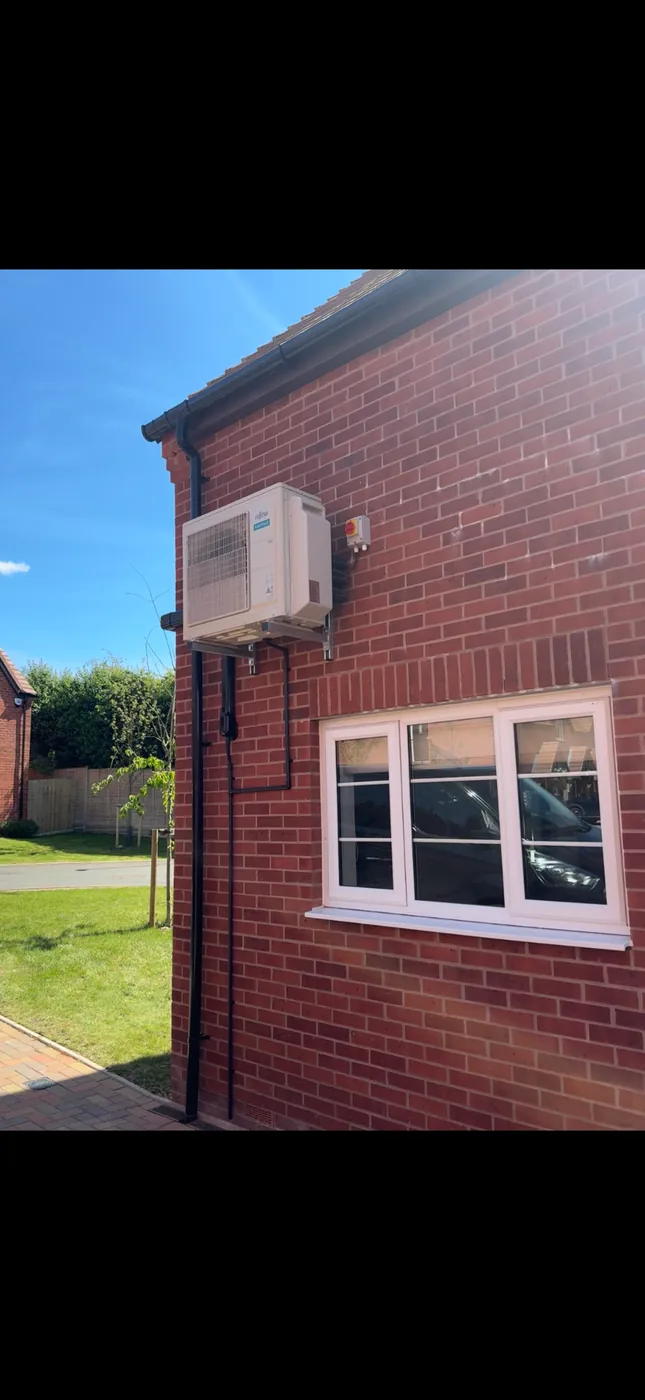 Fujitsu outdoor condenser installed on brackets
